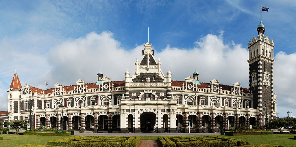 This image has an empty alt attribute; its file name is 1024px-Dunedin_Railway_Station_Full_Exterior.jpg